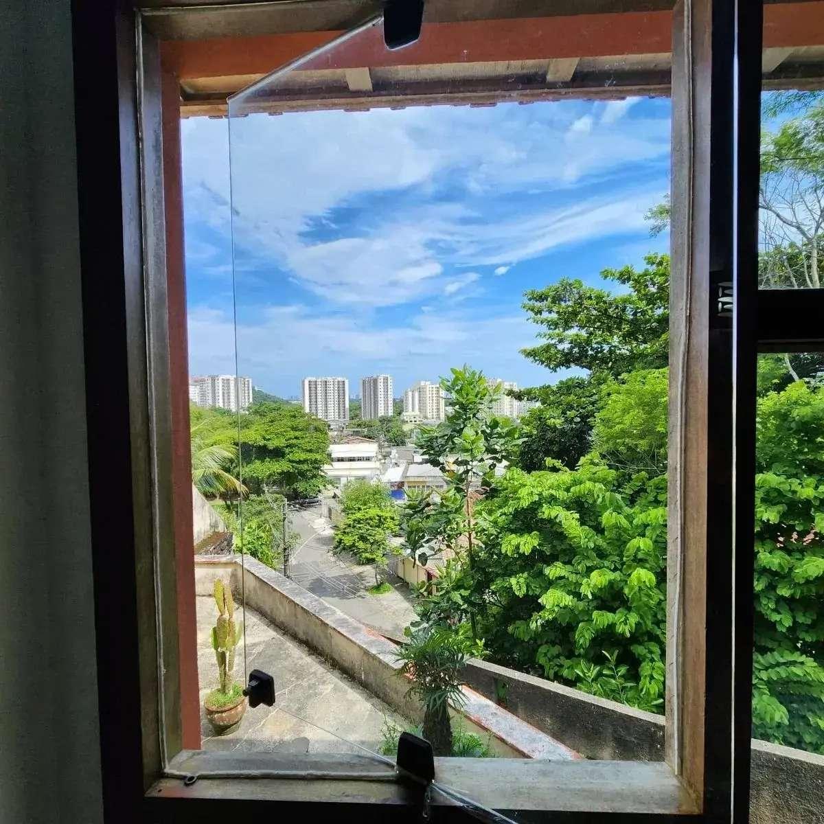 Casa integrada à natureza em terreno de 2.000m2